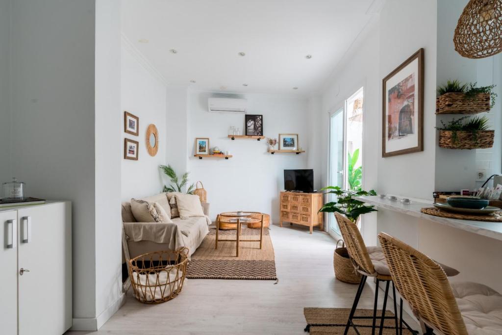 Część wypoczynkowa w obiekcie Oasis con patio y encanto en centro Sevilla