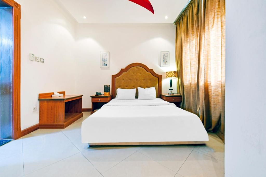 OYO 118 Revira Hotel - غرفة ديلوكس كينغ