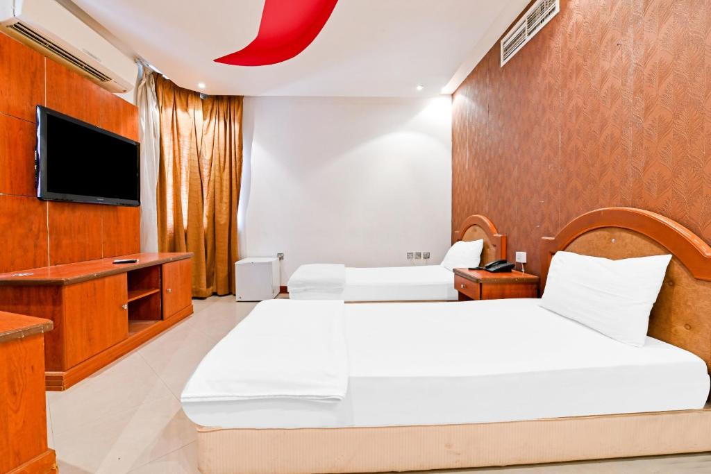 OYO 118 Revira Hotel - غرفة ديلوكس توأم