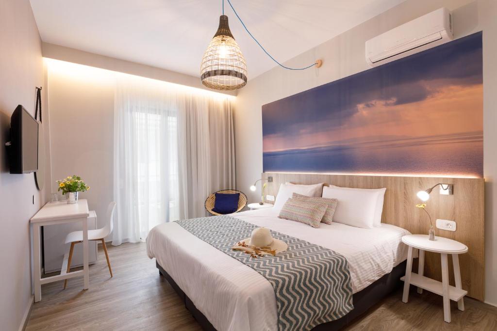 Postel nebo postele na pokoji v ubytování Sofia Hotel