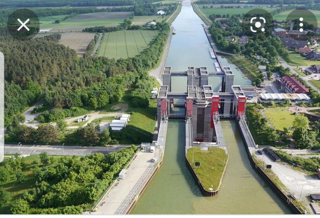 an aerial view of a river with a train in it at Ferienwohnung in Scharnebeck in Scharnebeck