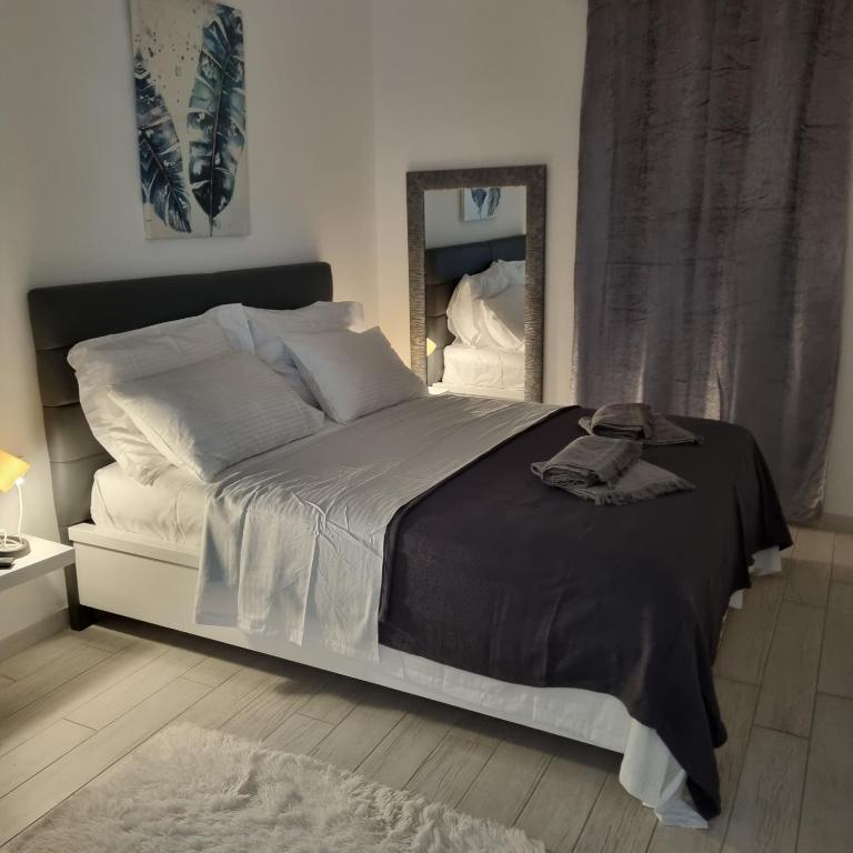 Posteľ alebo postele v izbe v ubytovaní Apartman Magnolija Umag