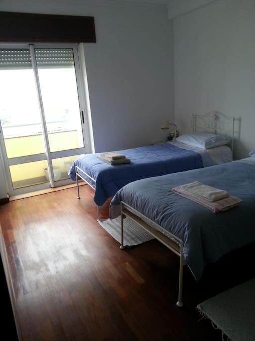 Postel nebo postele na pokoji v ubytování Rooftop Apartment