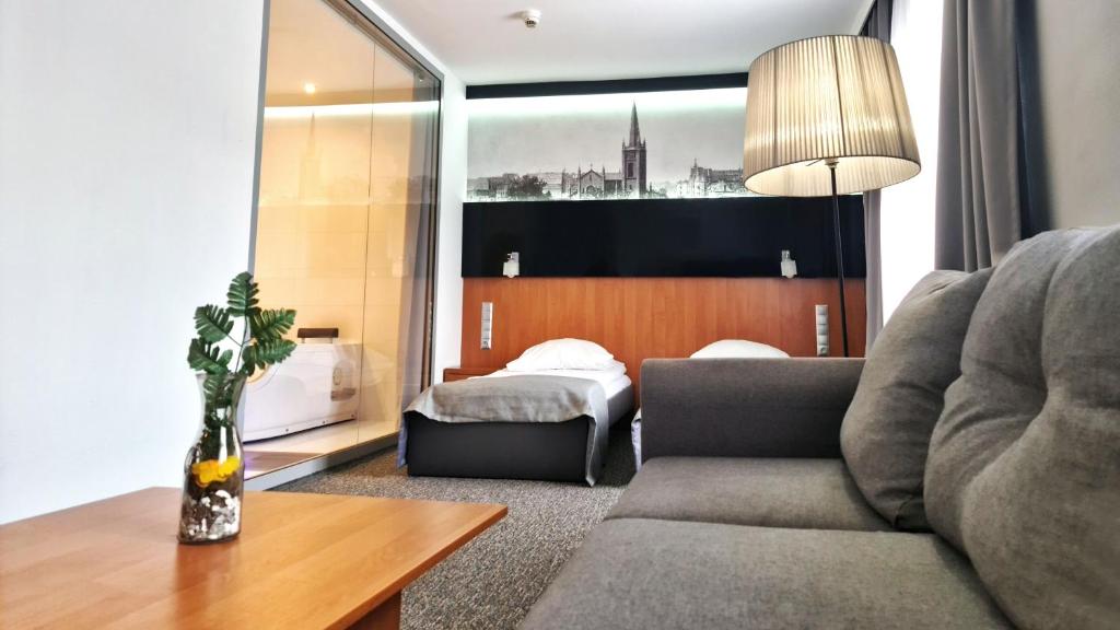 Posezení v ubytování Hotel Malinowski Economy
