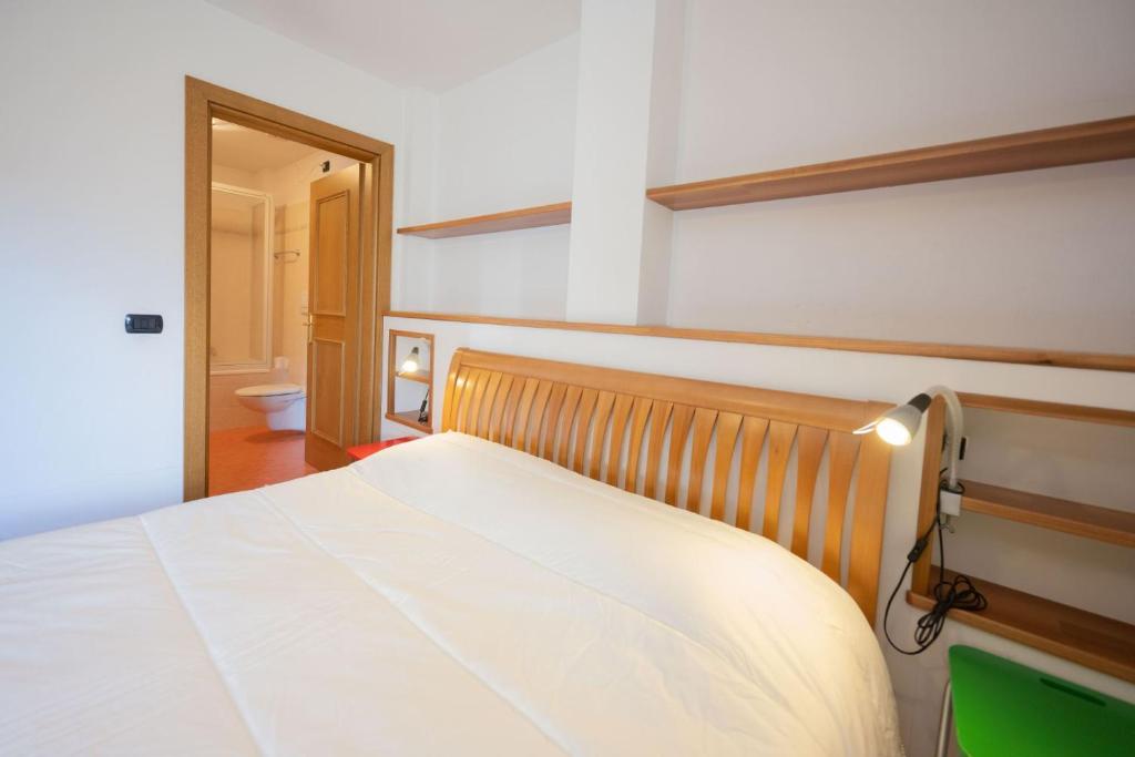 A bed or beds in a room at Cesa Pecedel