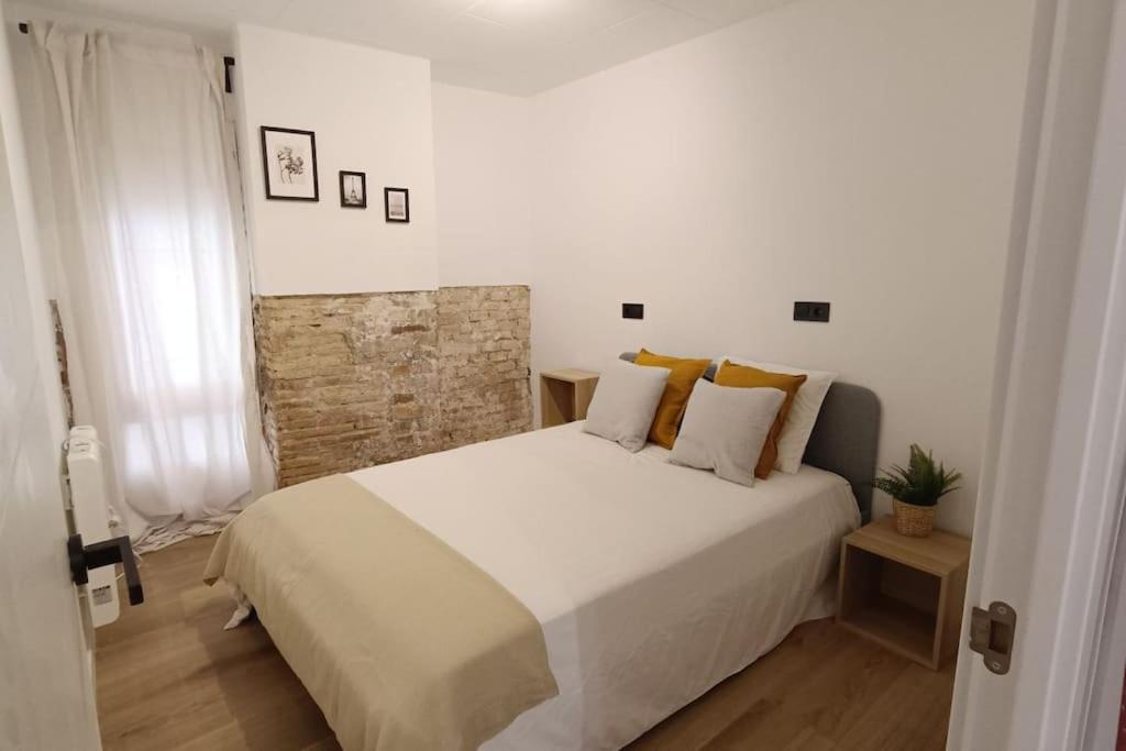 Postel nebo postele na pokoji v ubytování BOUTIQUE Apartment AVE Centro Lleida