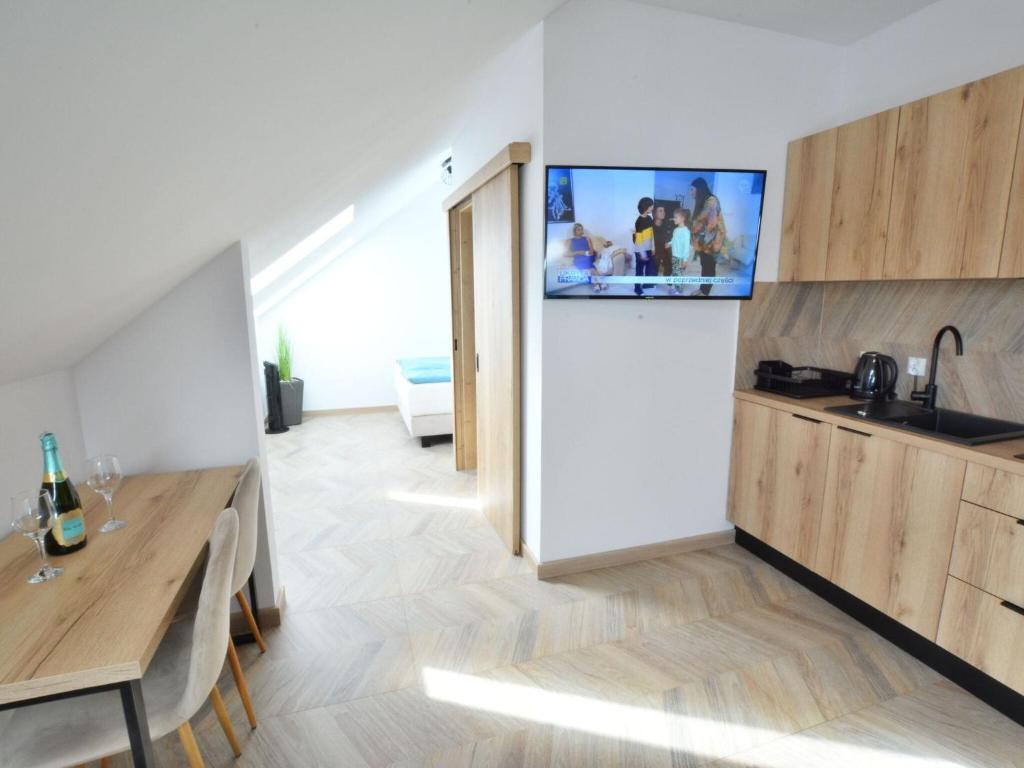 Kuchyňa alebo kuchynka v ubytovaní Apartment right by the sea, Ustronie Morskie