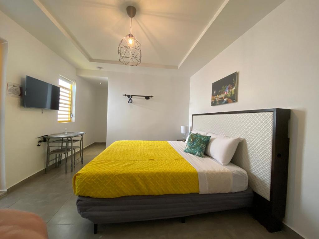 Postel nebo postele na pokoji v ubytování Hotel Nest