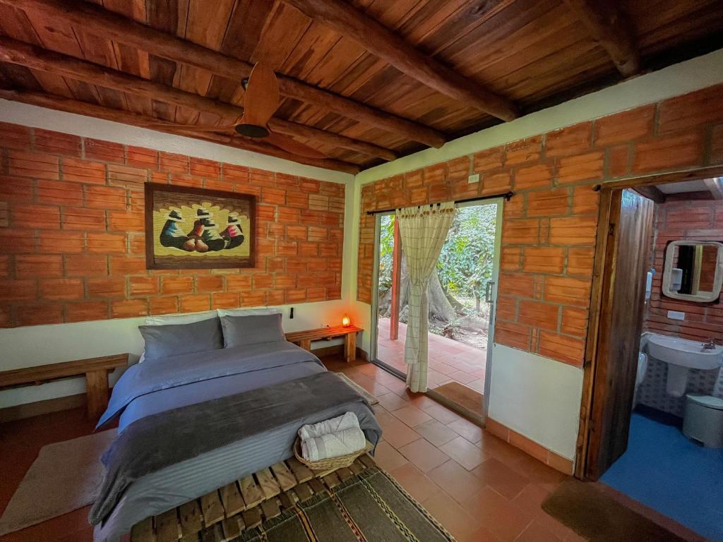 Postel nebo postele na pokoji v ubytování Origen Hostel