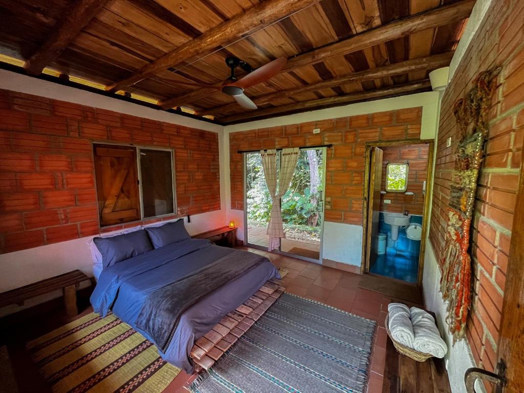 Postel nebo postele na pokoji v ubytování Origen Hostel