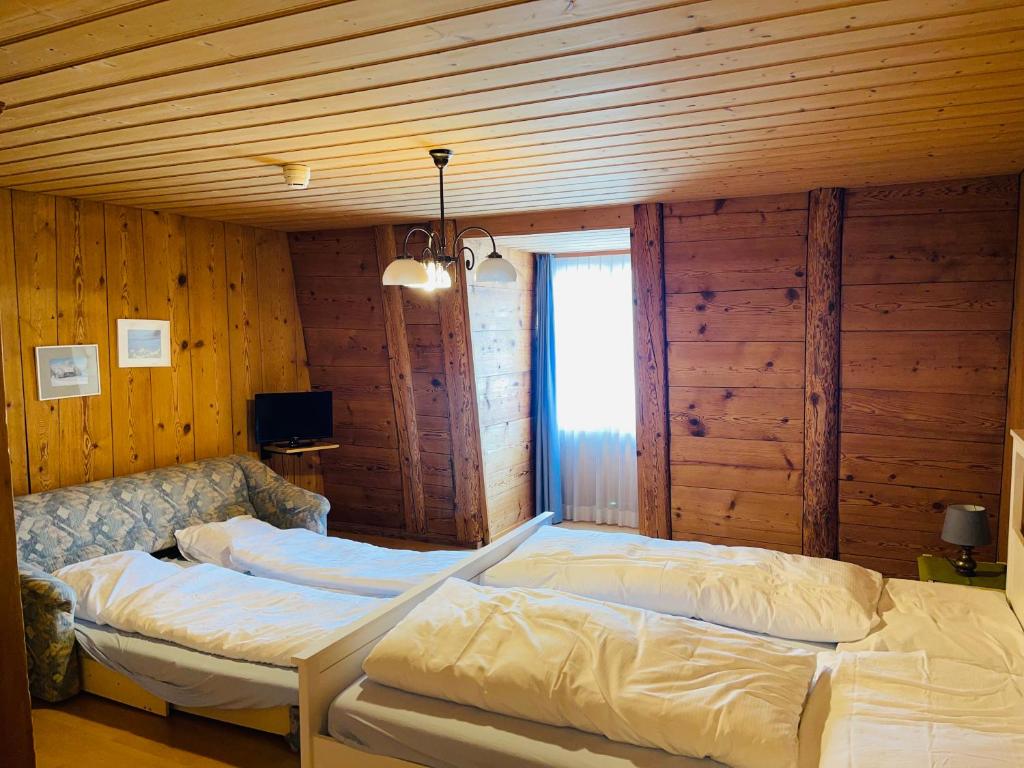 Ένα ή περισσότερα κρεβάτια σε δωμάτιο στο Hotel Sternen Worb
