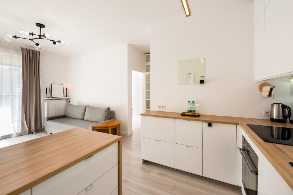 Kuchyňa alebo kuchynka v ubytovaní Ingenious Wilanów Oasis Apartment