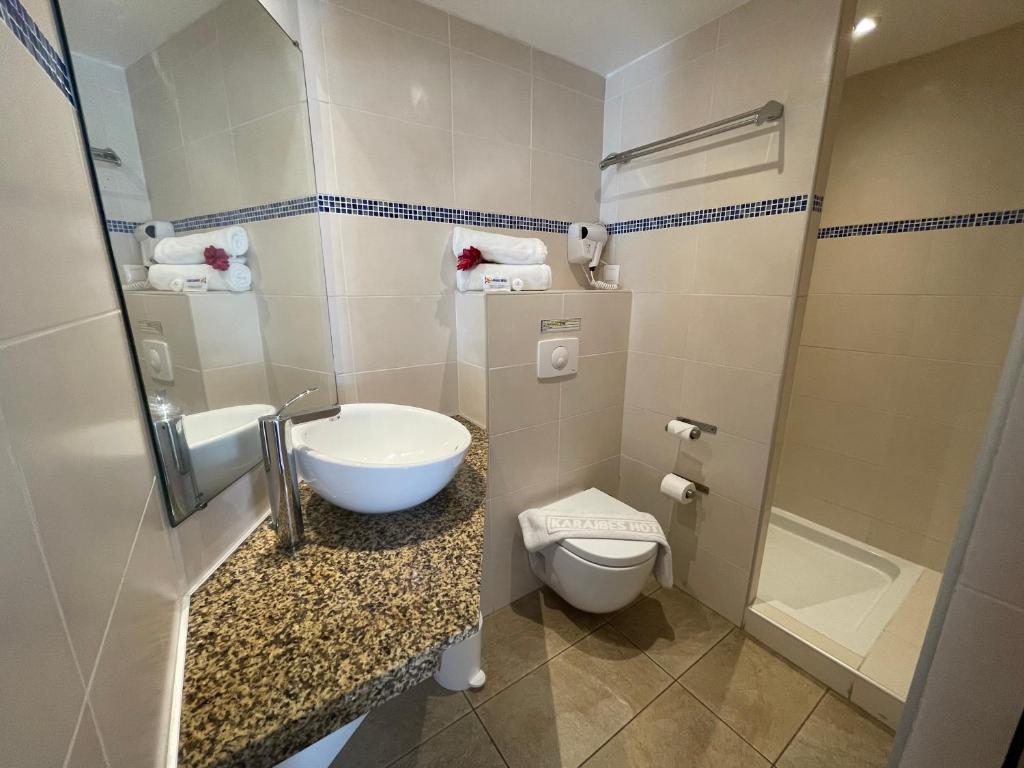 Koupelna v ubytování Karaibes Hotel