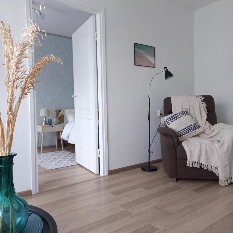 Postel nebo postele na pokoji v ubytování Narva Relax Apartment