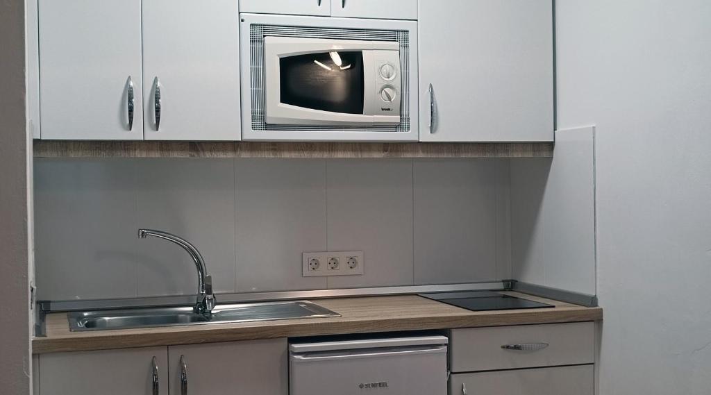 A kitchen or kitchenette at Marina Elite