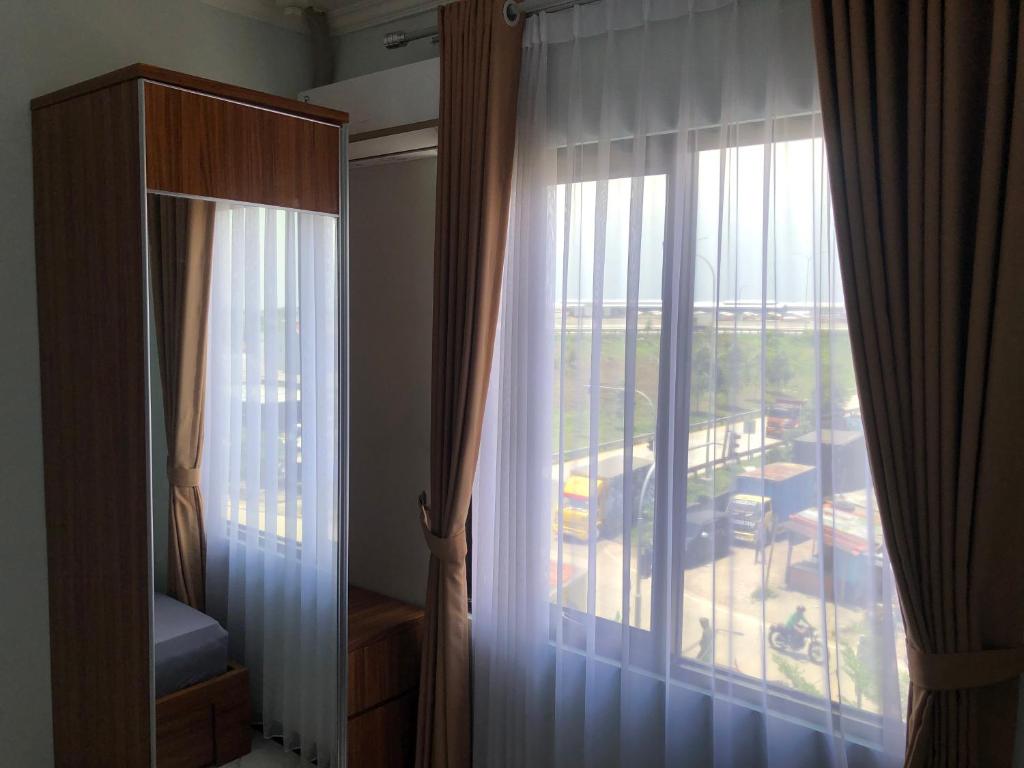 Fotografie z fotogalerie ubytování Bening Asri Guesthouse v destinaci Gombolpaya