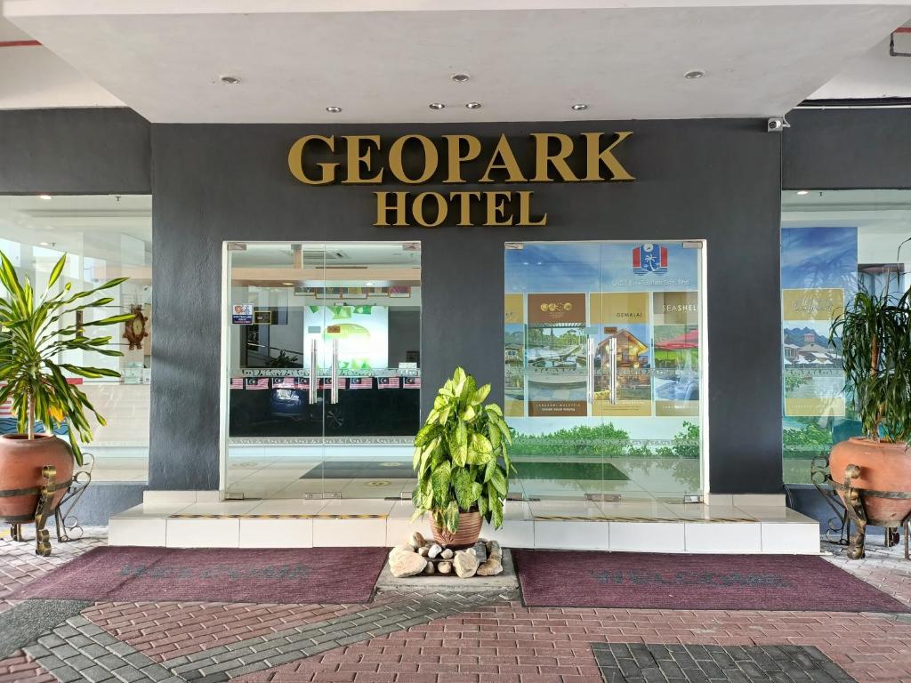a store front with a sign that reads geographic hotel at Geopark Hotel Kuah Langkawi in Kuah