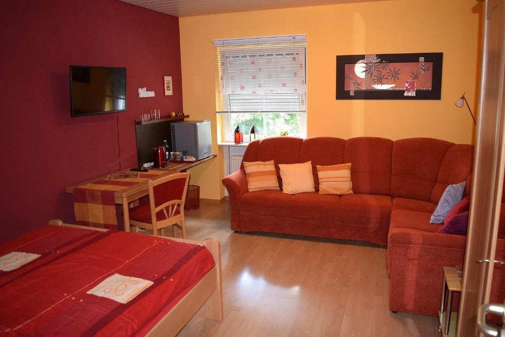 TV a/nebo společenská místnost v ubytování Gästezimmer Leonore