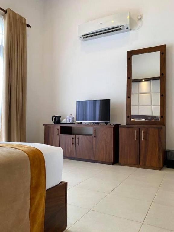 TV a/nebo společenská místnost v ubytování Serenity Villa Dambulla