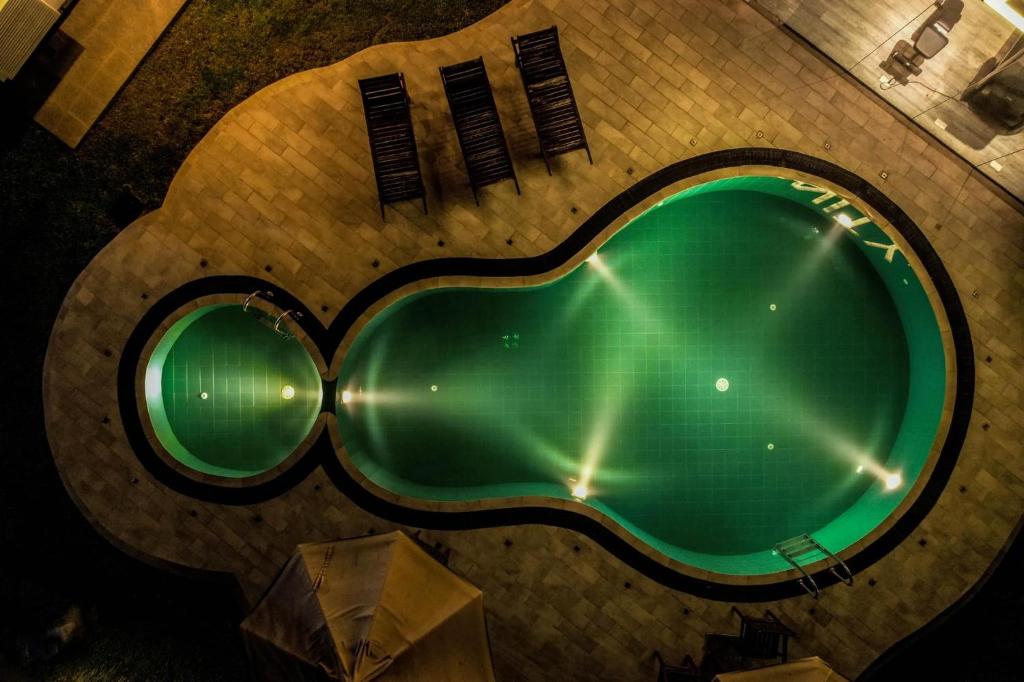 Bazén v ubytování Serenity Villa Dambulla nebo v jeho okolí