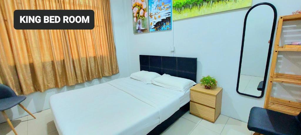 Postel nebo postele na pokoji v ubytování Kota Kinabalu Sabah City Homestay