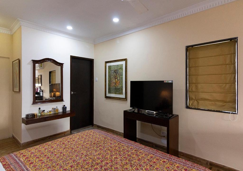TV a/nebo společenská místnost v ubytování Neelam Bed & Breakfast