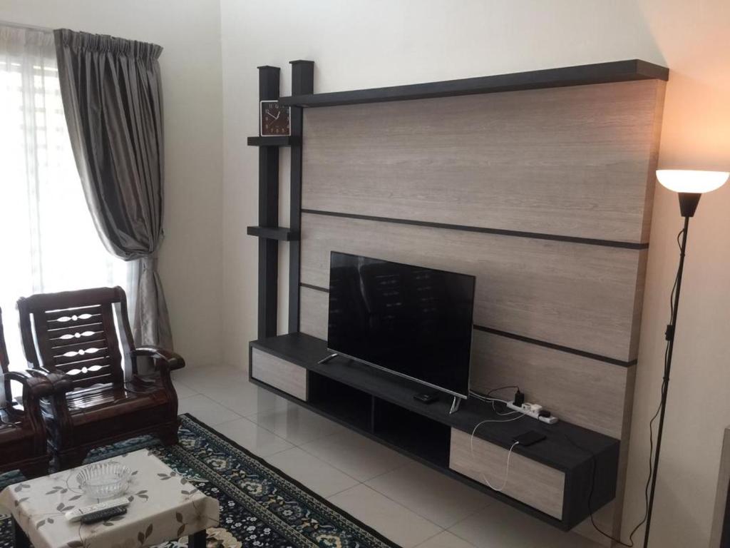 TV a/nebo společenská místnost v ubytování Koolest homestays Meru