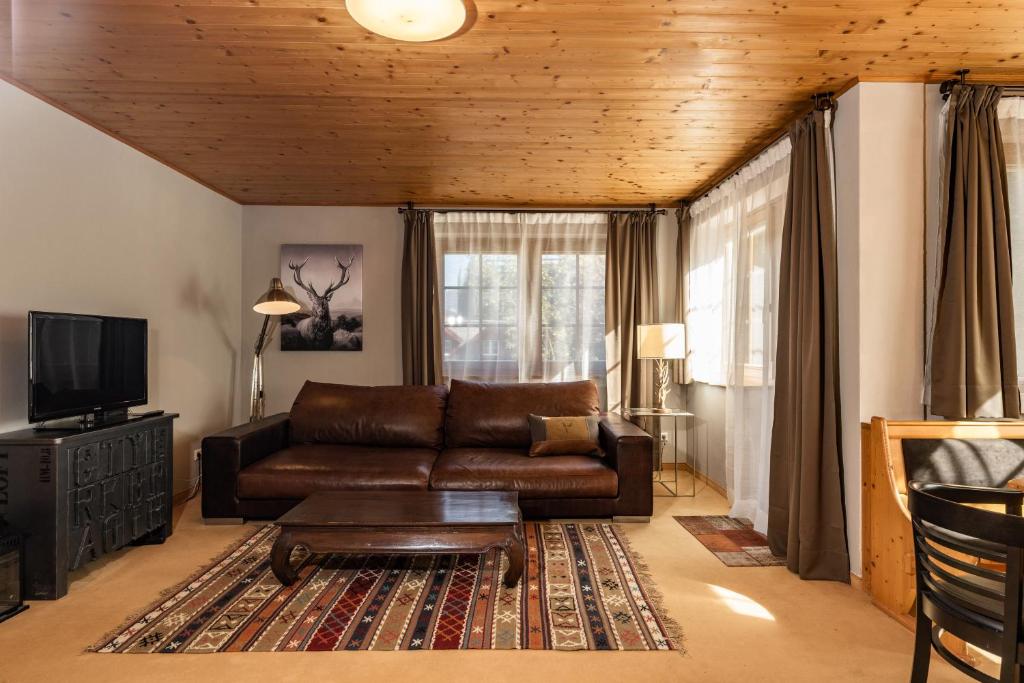 Televízia a/alebo spoločenská miestnosť v ubytovaní Appartements Planai by Schladmingurlaub