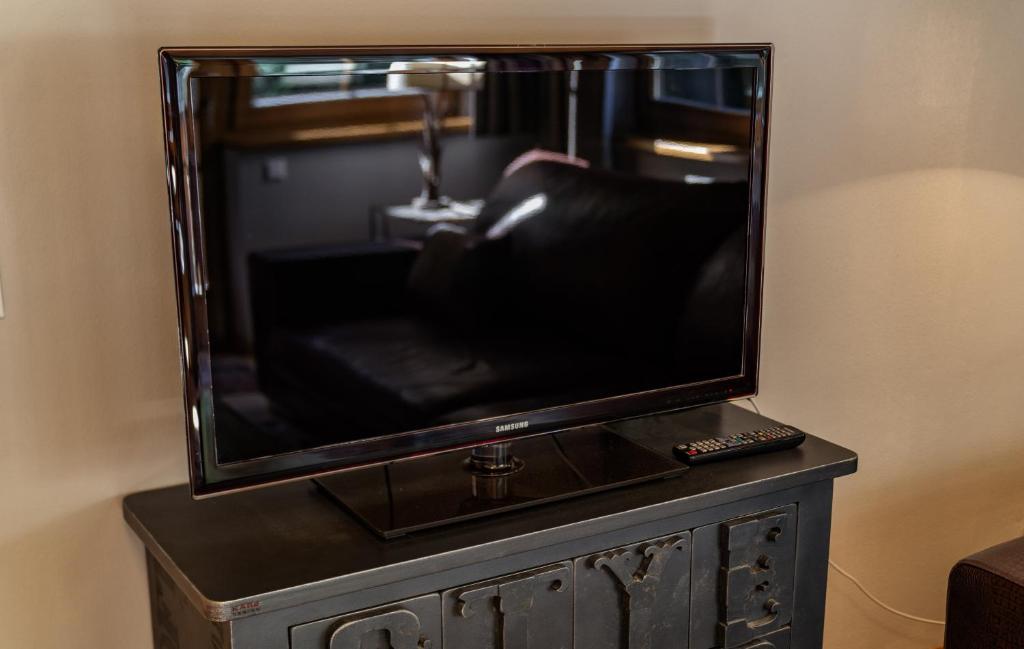 Televízia a/alebo spoločenská miestnosť v ubytovaní Appartements Planai by Schladmingurlaub