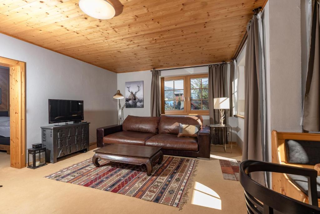 Televízia a/alebo spoločenská miestnosť v ubytovaní Appartements Planai by Schladmingurlaub