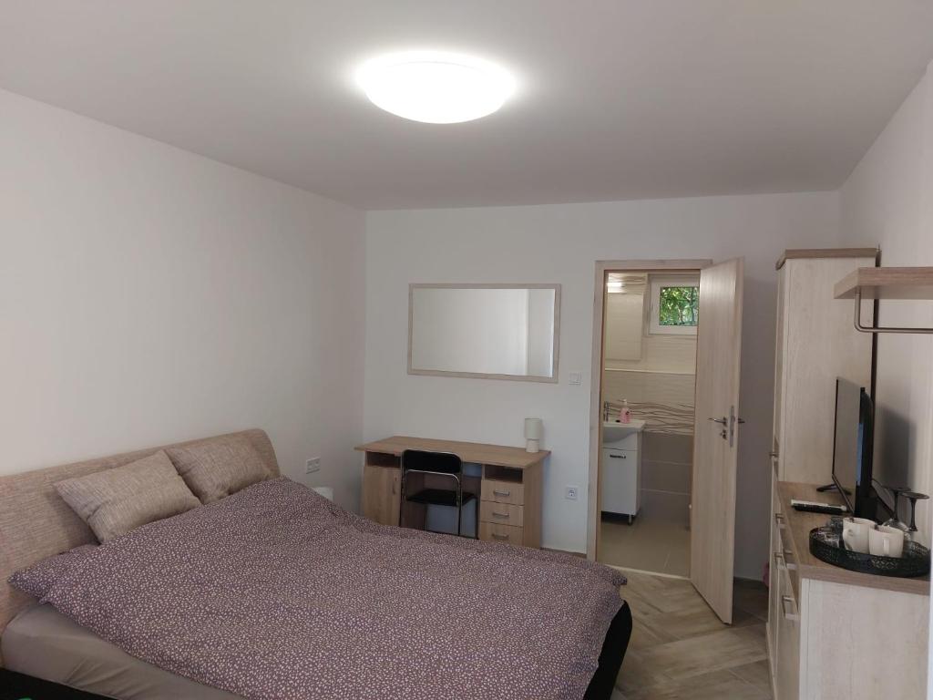 Kuchyňa alebo kuchynka v ubytovaní Szépasszonyvölgy Apartman