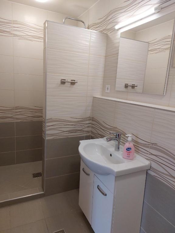 Kúpeľňa v ubytovaní Szépasszonyvölgy Apartman