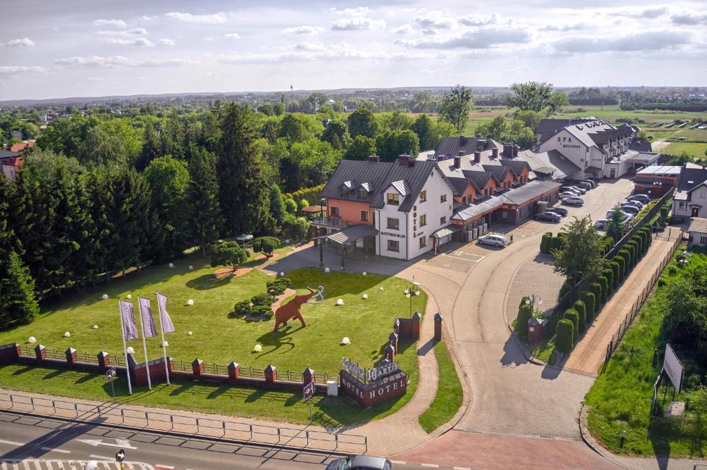 an aerial view of a small town with a park at Artis Hotel & Spa in Zamość