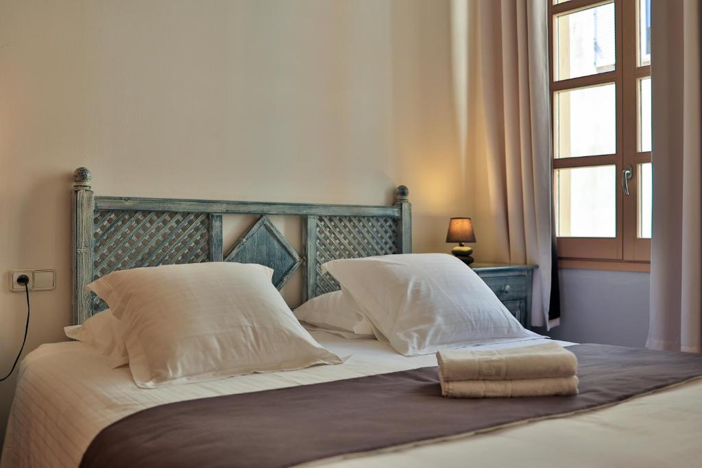 Postel nebo postele na pokoji v ubytování Hôtel Playa