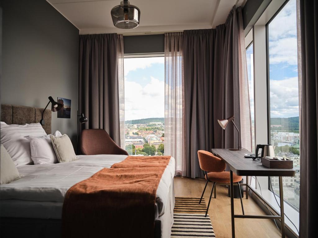 Postel nebo postele na pokoji v ubytování Quality Hotel Match