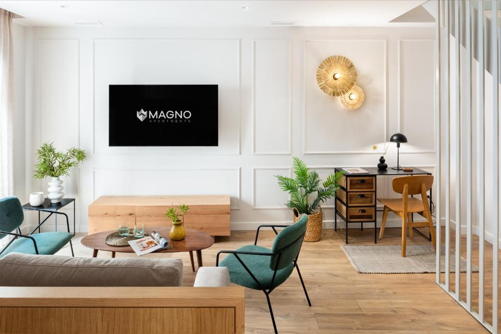 Μια τηλεόραση ή/και κέντρο ψυχαγωγίας στο Magno Apartments Cabo Noval Luxury House