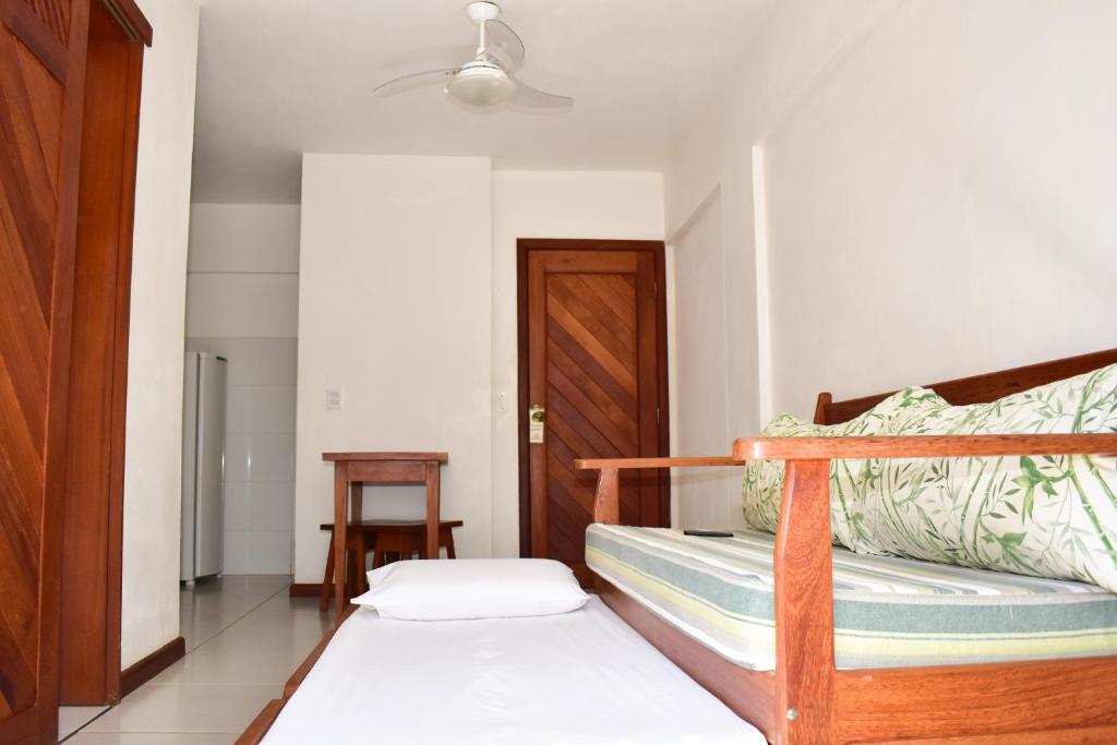 Postel nebo postele na pokoji v ubytování Arpoador Flat