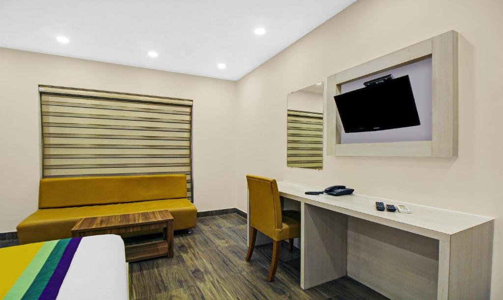 TV a/nebo společenská místnost v ubytování Itsy Hotels Transit Express