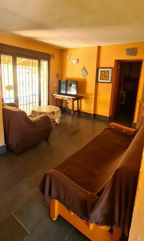 TV a/nebo společenská místnost v ubytování Casa la hijita