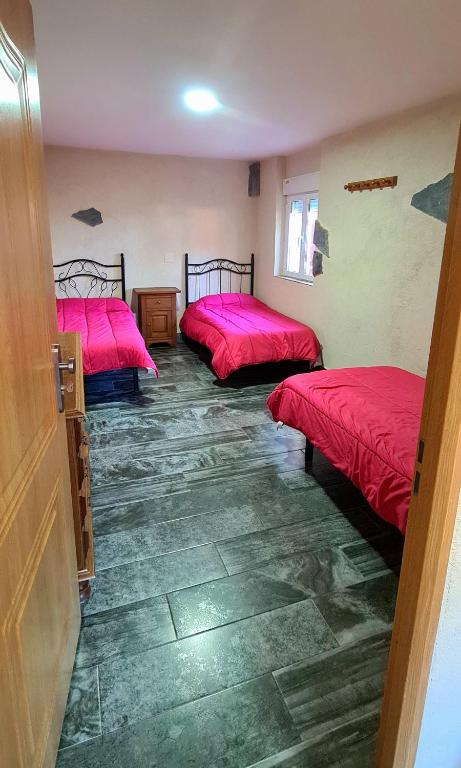 Postel nebo postele na pokoji v ubytování Casa la hijita
