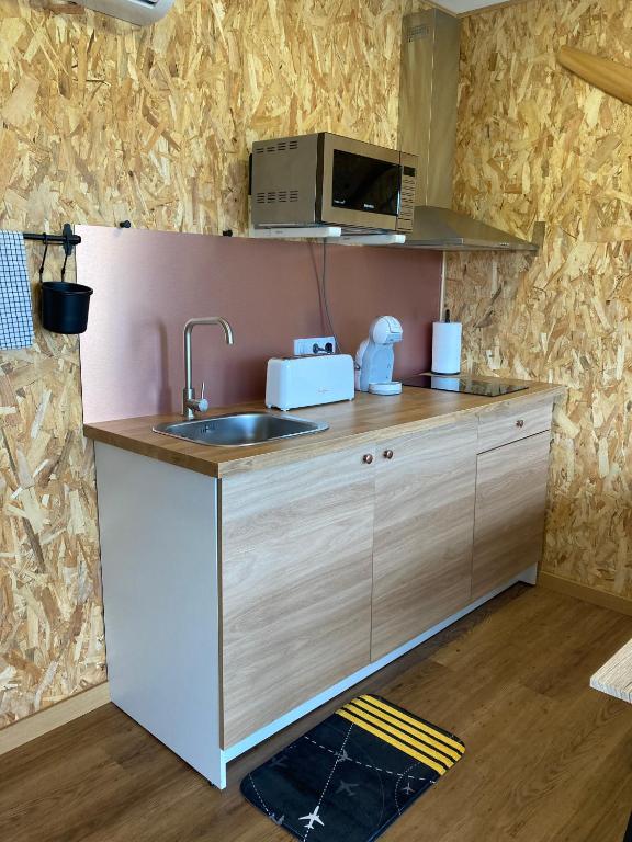 Kuchyň nebo kuchyňský kout v ubytování AIR FERVENZA