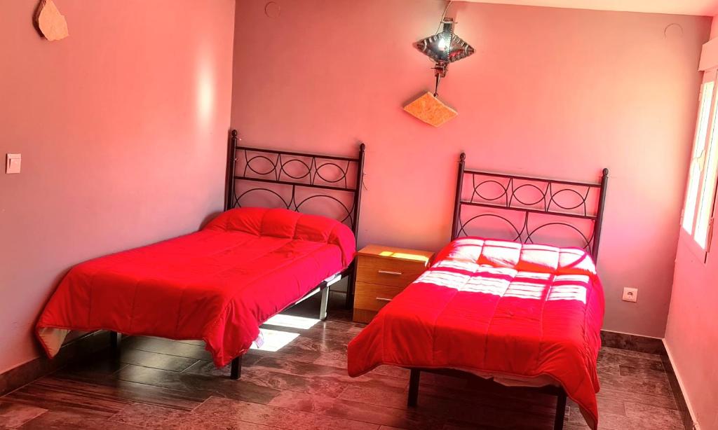 Postel nebo postele na pokoji v ubytování Casa la hijita