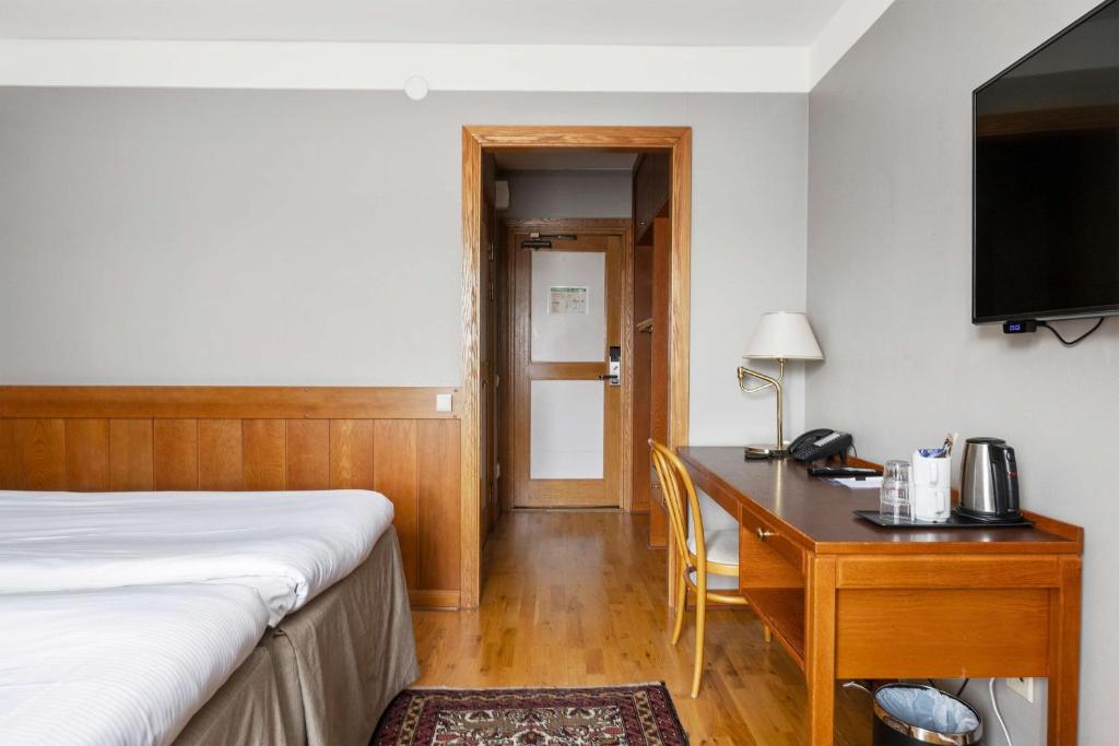 Кровать или кровати в номере Best Western Gustaf Wasa Hotel