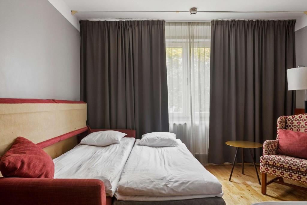 Кровать или кровати в номере Best Western Gustaf Wasa Hotel