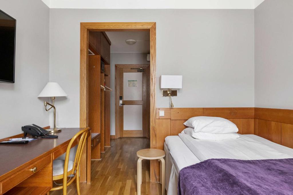 Кровать или кровати в номере Best Western Gustaf Wasa Hotel