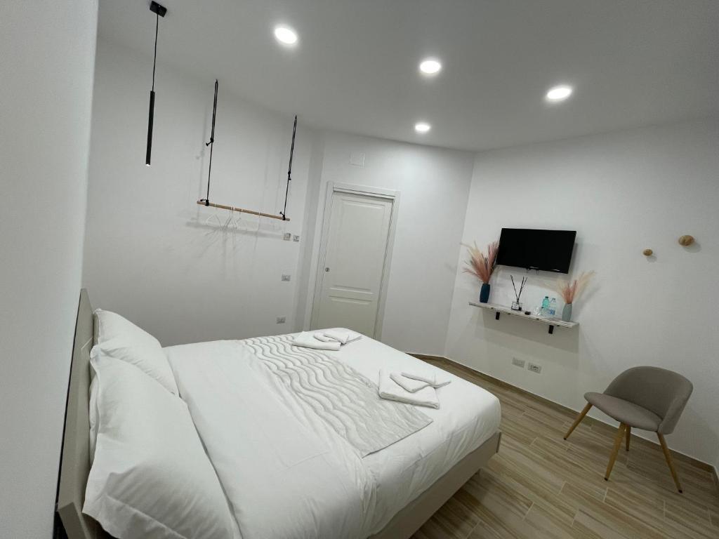 Televízia a/alebo spoločenská miestnosť v ubytovaní All'Uscita B&b