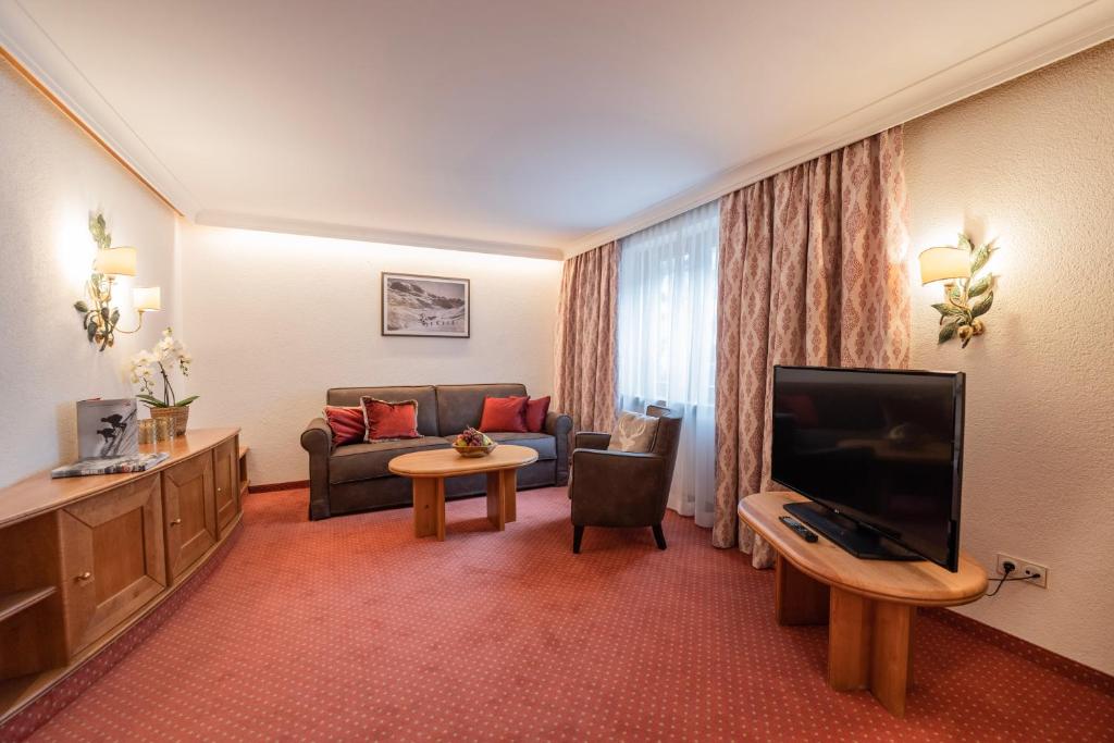 TV a/nebo společenská místnost v ubytování Hotel Ulli