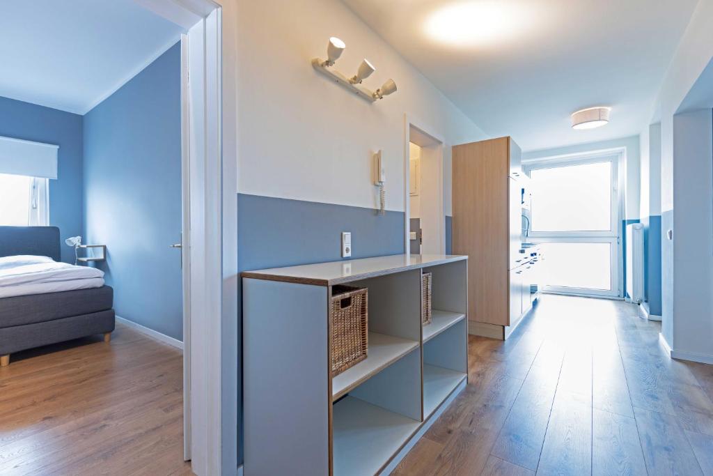 Postel nebo postele na pokoji v ubytování Boardinghouse St.Pauli