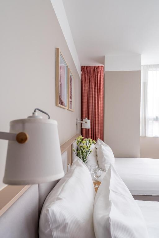 Postel nebo postele na pokoji v ubytování Hotel Altus Poznań Old Town - Destigo Hotels