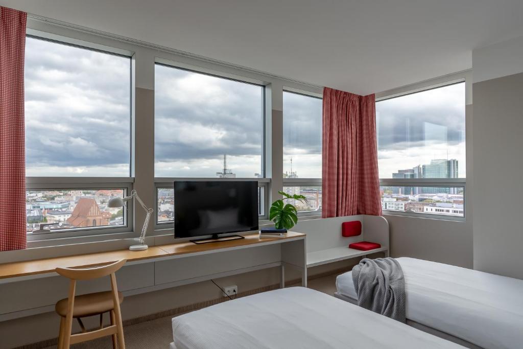 TV a/nebo společenská místnost v ubytování Hotel Altus Poznań Old Town - Destigo Hotels